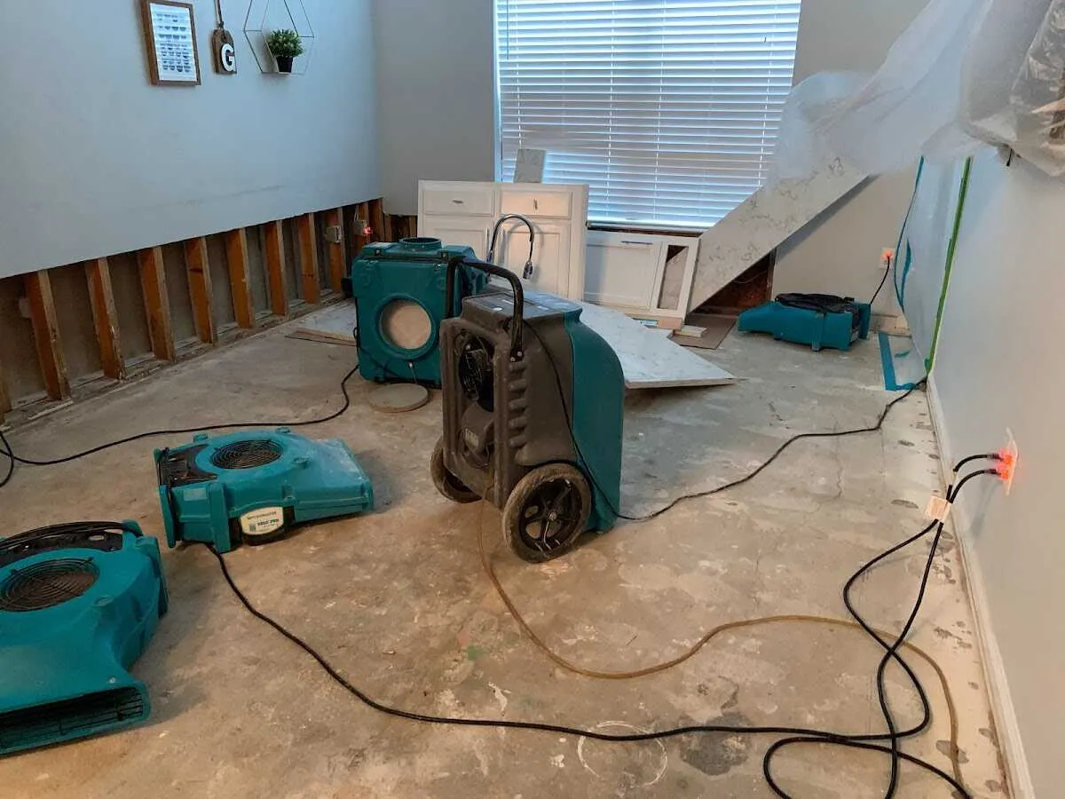 Dehumidifier in flood-cut room for Water Damage Restoration in Prospect Heights